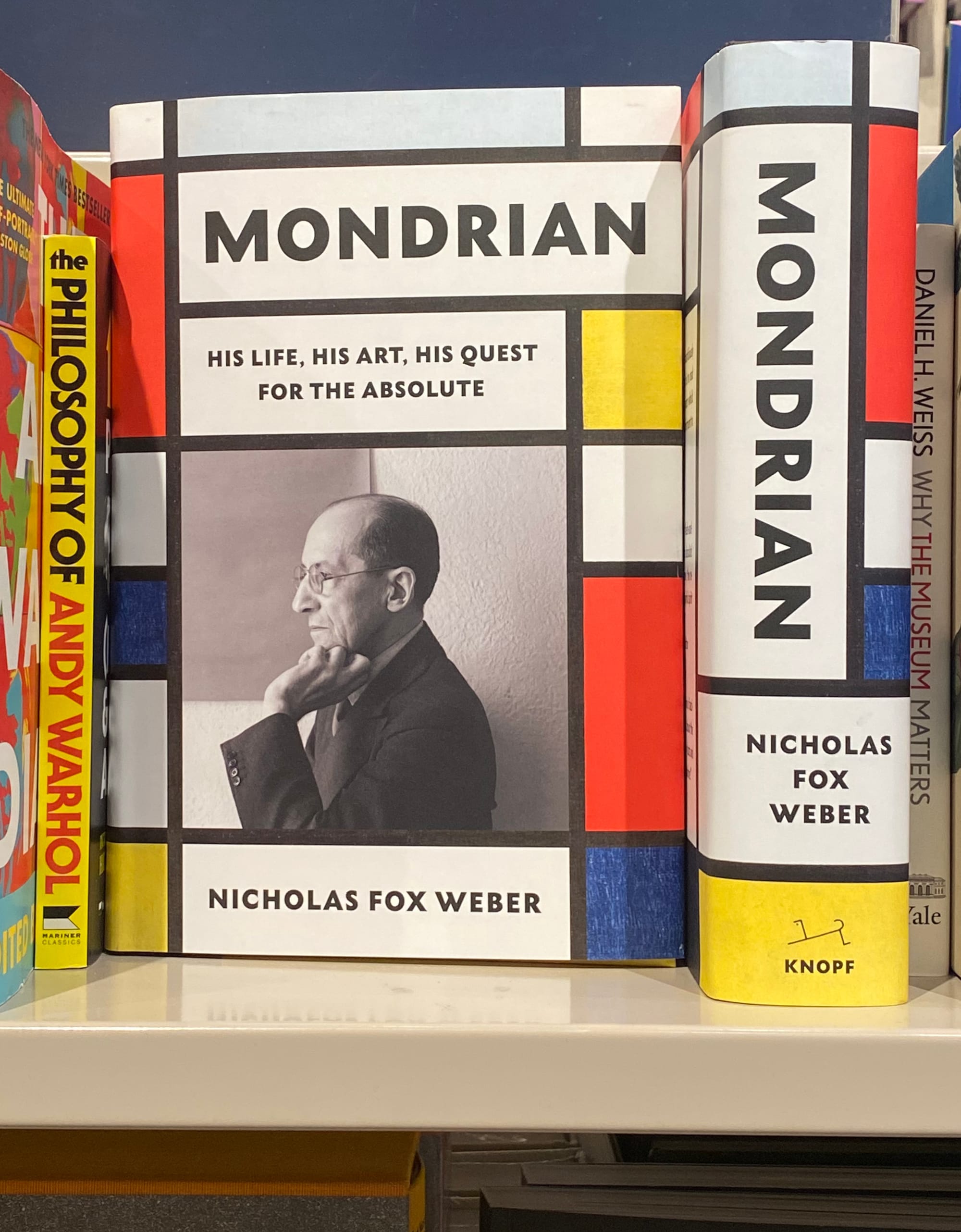 Two copies of Mondrian book, one face out, once spine out. The cover design has the look of his most famous paintings.