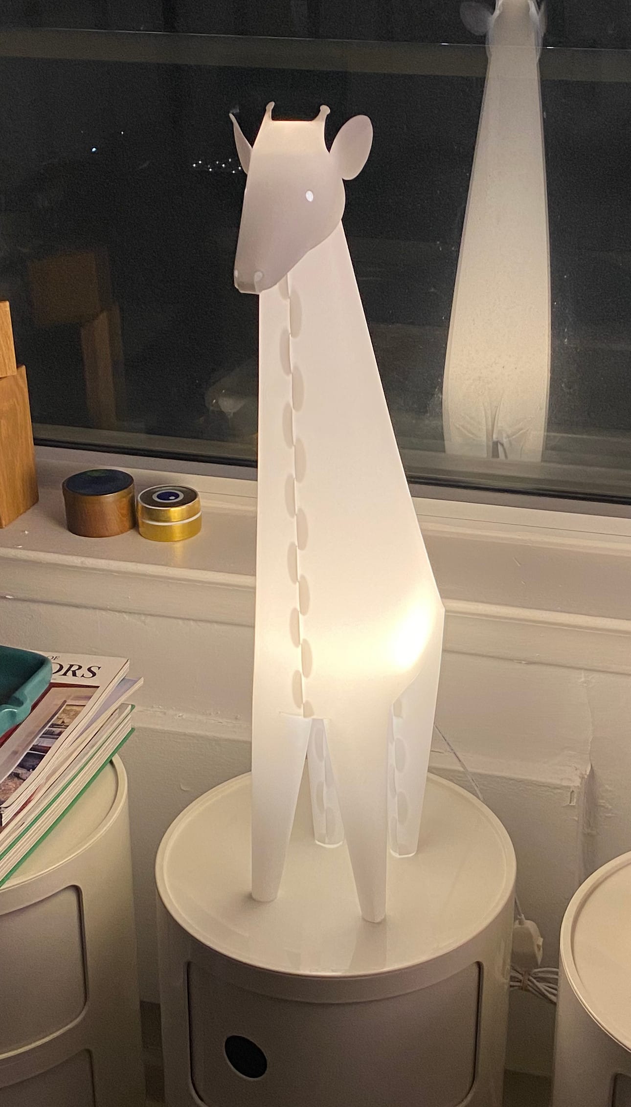 Giraffe night light lit up in my living room.