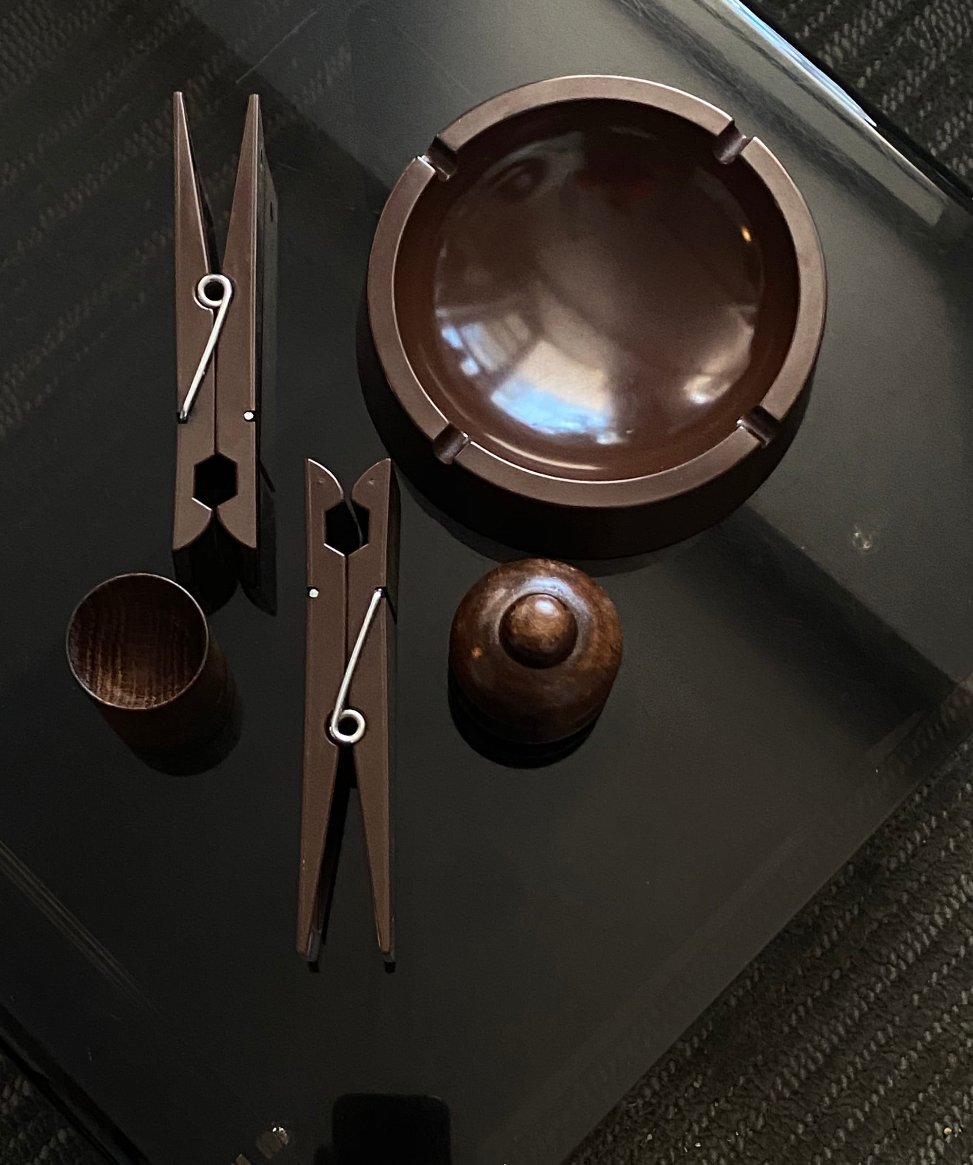 Brown objects on dark brown tabletop.